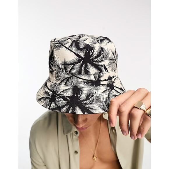ASOS Men’s Boardmans reversible bucket hat in black and palm tree print - Picture 1 of 4